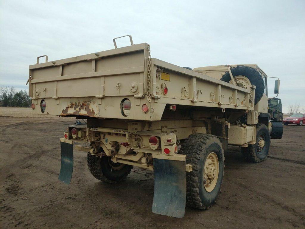solid 1999 Stewart & Stevenson M1079 LMTV Cargo Truck military